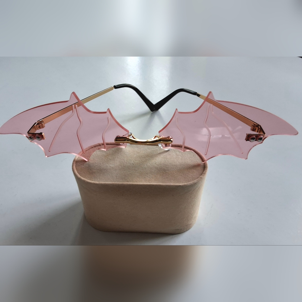 Whimsical Pink and Black Bat Wing Sunglasses